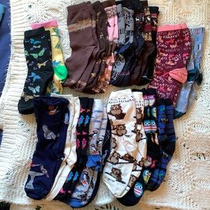 Women’’s socks 19 pairs gently used no holes good elastic wildlife/animal themed